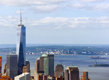 View Of The Freedom Tower With The Statue Of Liberty