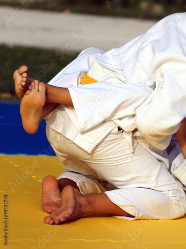 Photo martial arts combat during the sporting event