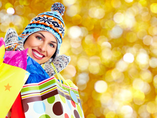 Poster - Beautiful shopping Christmas woman with bags.