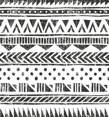 Wall Mural - vector seamless tribal texture. primitive geometric background in grunge style.