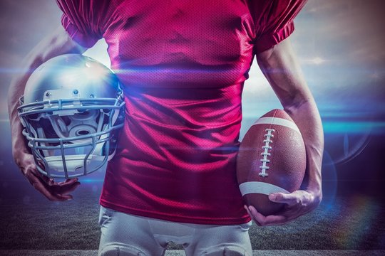 Composite image of american football player holding ball and helmet