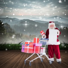 Poster - Composite image of santa delivering gifts from cart