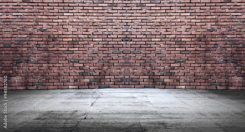 Concrete floor with old red brick wall, empty room