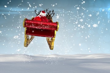 Wall Mural - Composite image of santa flying his sleigh