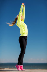 Sticker - woman doing yoga outdoors