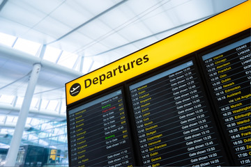 Fototapete - Flight information, arrival, departure at the airport, London, E