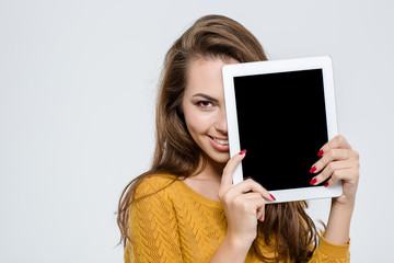 Sticker - Woman covering half face with tablet computer