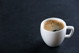 Fototapeta Mapy - Cup of coffee on table close up