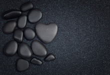 Black Stones With Black Zen Heart Shaped Rock On Grain Sand