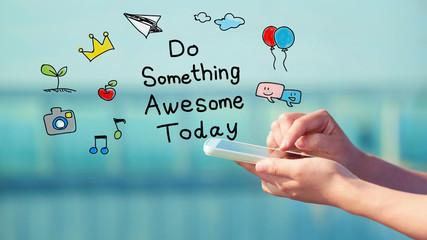 do something awesome today concept with smartphone
