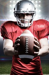 Poster - Composite image of american football player holding ball