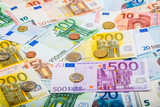 Fototapeta  - Closeup of banknotes and coins