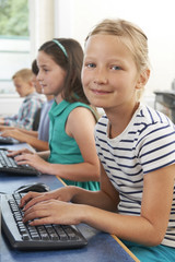 Wall Mural - Group Of Elementary School Children In Computer Class