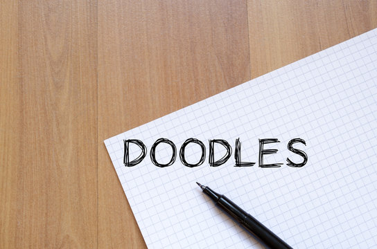 Doodles write on notebook