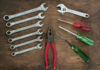 Set of  tools/Set of  tools on wood background.