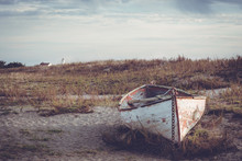 Old Abandoned Boat Sits On A Fort Warden Beach In Washington State, Just Outside Port Townsend, WA, USA. 