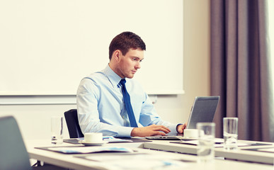 businessman with laptop working in office