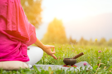 Yoga position with Tibetan bell