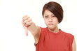 woman with thumbs down gesture