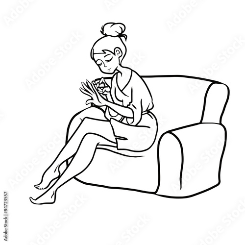 Girl In Bathrobe Make Manicure On The Couch Buy This Stock
