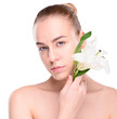 © chettythomas - Beauty young woman posing with lily.