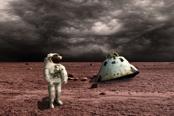 Wall Mural - a marooned astronaut surveys his situation - elements of this image furnished by nasa.