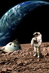 Wall Mural - a stranded astronaut surveys his situation - elements of this image furnished by nasa.