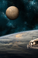 Wall Mural - a team of astronauts work on a space station - elements of this image furnished by nasa.