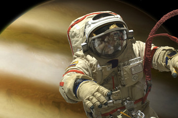 Wall Mural - a cosmonaut floats in space. - elements of this image furnished by nasa.