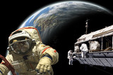 Fototapeta Pokój dzieciecy - A team of astronauts and cosmonauts perform work in space - Elements of this image furnished by NASA.