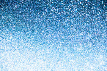 Blue bokeh winter snowy christmas abstract background