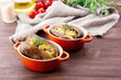 © Africa Studio - Baked potatoes with cheese and mushrooms on table close up