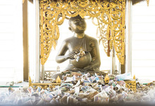 Money Bill Offerings In Front Of A Golden Buddha Statue, Myanmar