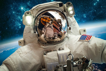Wall Mural - astronaut in outer space