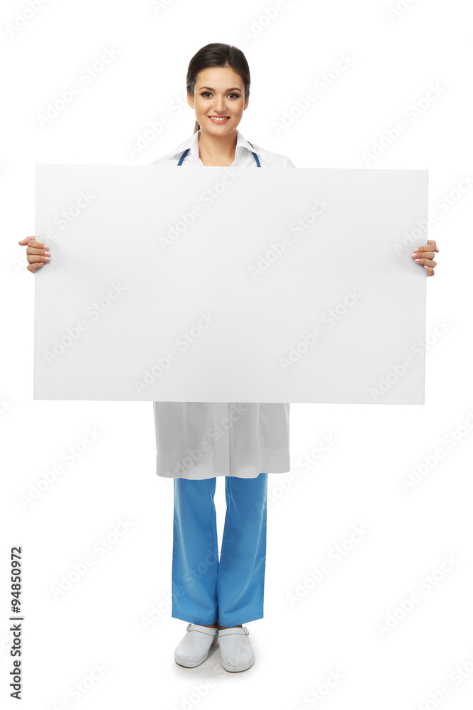 Smiling medical doctor holding a screen isolated on white