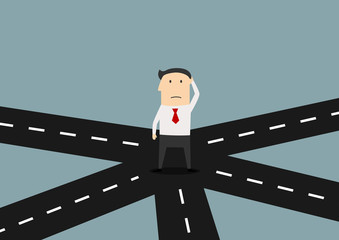 Businessman on crossroad choosing direction