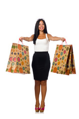 Woman with shopping bags on white