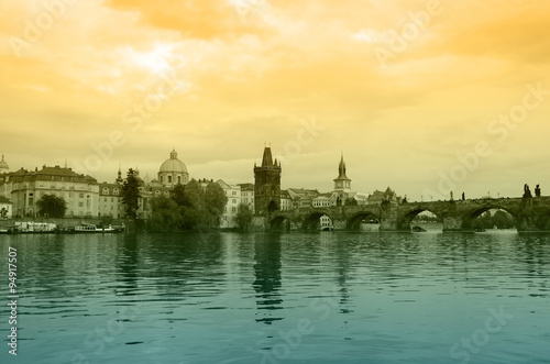 Fotografie, Obraz Charles bridge and Vltava river on sunset