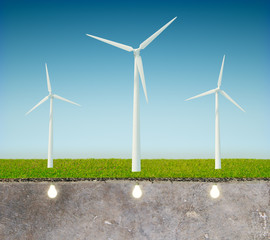 Poster - Gree energy concept with windmill, blue sky and light bulbs