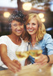 © Flamingo Images - Fun friends celebrating with white wine