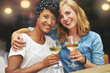 © Flamingo Images - Two gorgeous women enjoying a glass of wine
