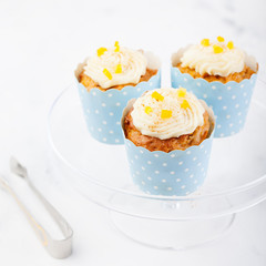 Canvas Print - Carrot cupcakes decorated with cream cheese frosting 