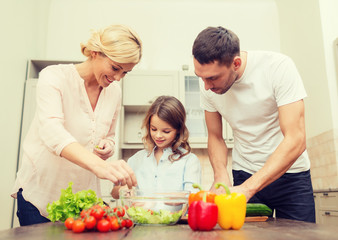 Poster - happy family making dinner in kitchen