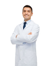 Smiling Male Doctor In White Coat