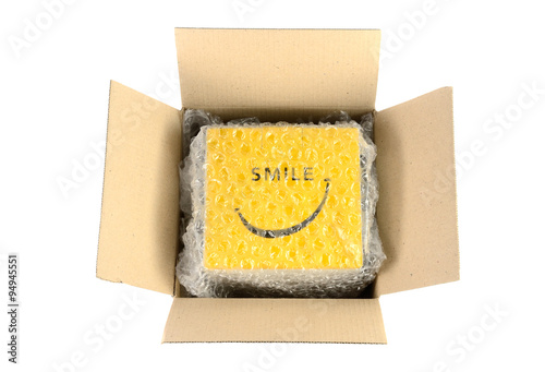 Fotografia, Obraz Unwrap cardboard box isolated on white background