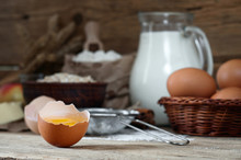 Egg Yolk On A Wooden Table  Closeup