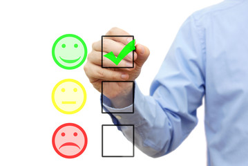 businessman is choosing smile on checklist, customer satisfactio