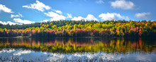 Colorful Reflections On The Lake In September.