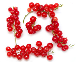 Wall Mural - Ripe red currant on a white background