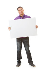 Wall Mural - Smiling Man Stands With Blank White Card